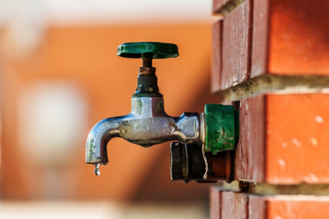 Spigot on a wall